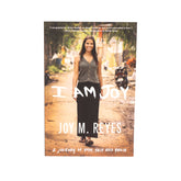 Book cover of 'I Am Joy' by Joy M. Reyes with a woman walking on a street.