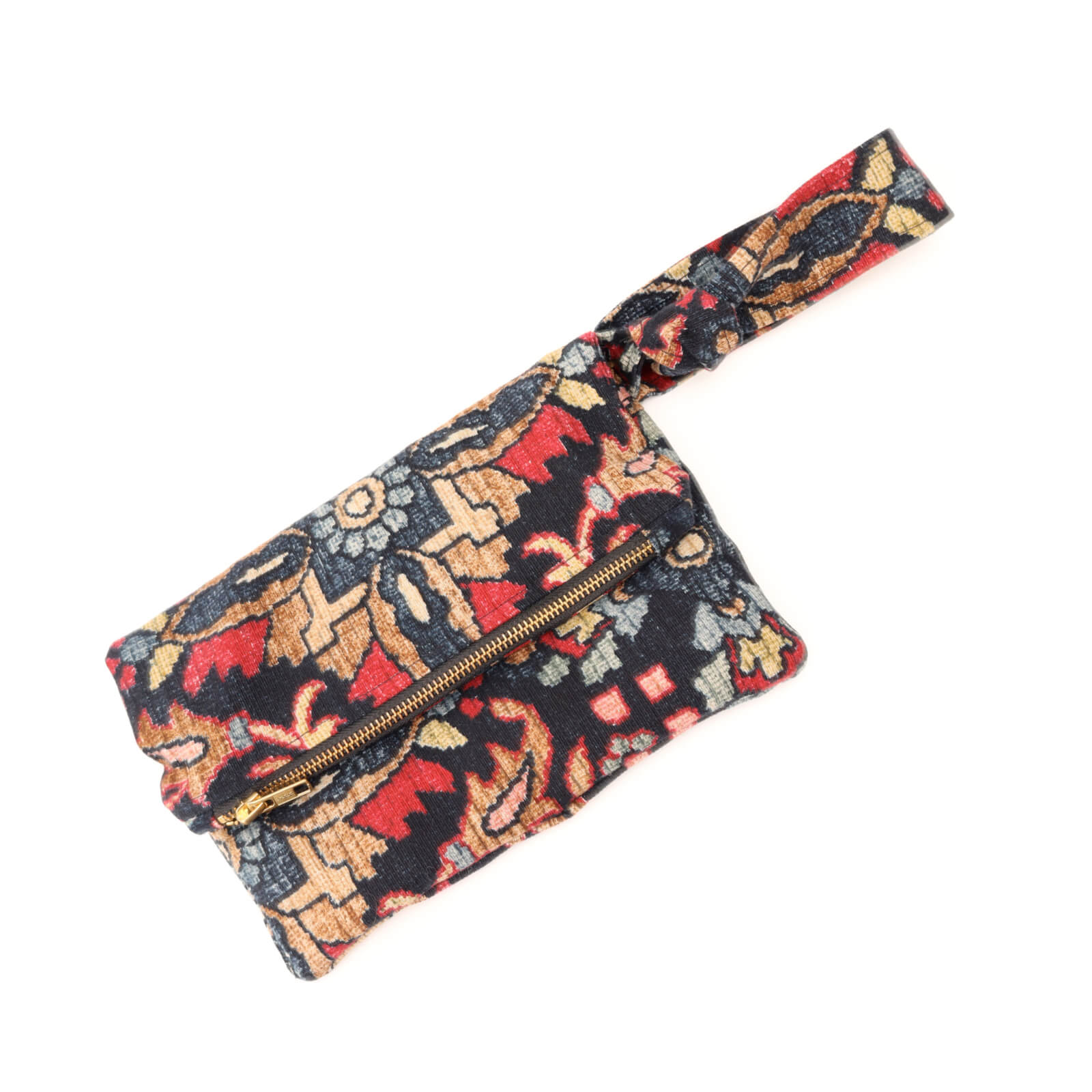 Multicolored patterned waist bag with a zipper on a white background
