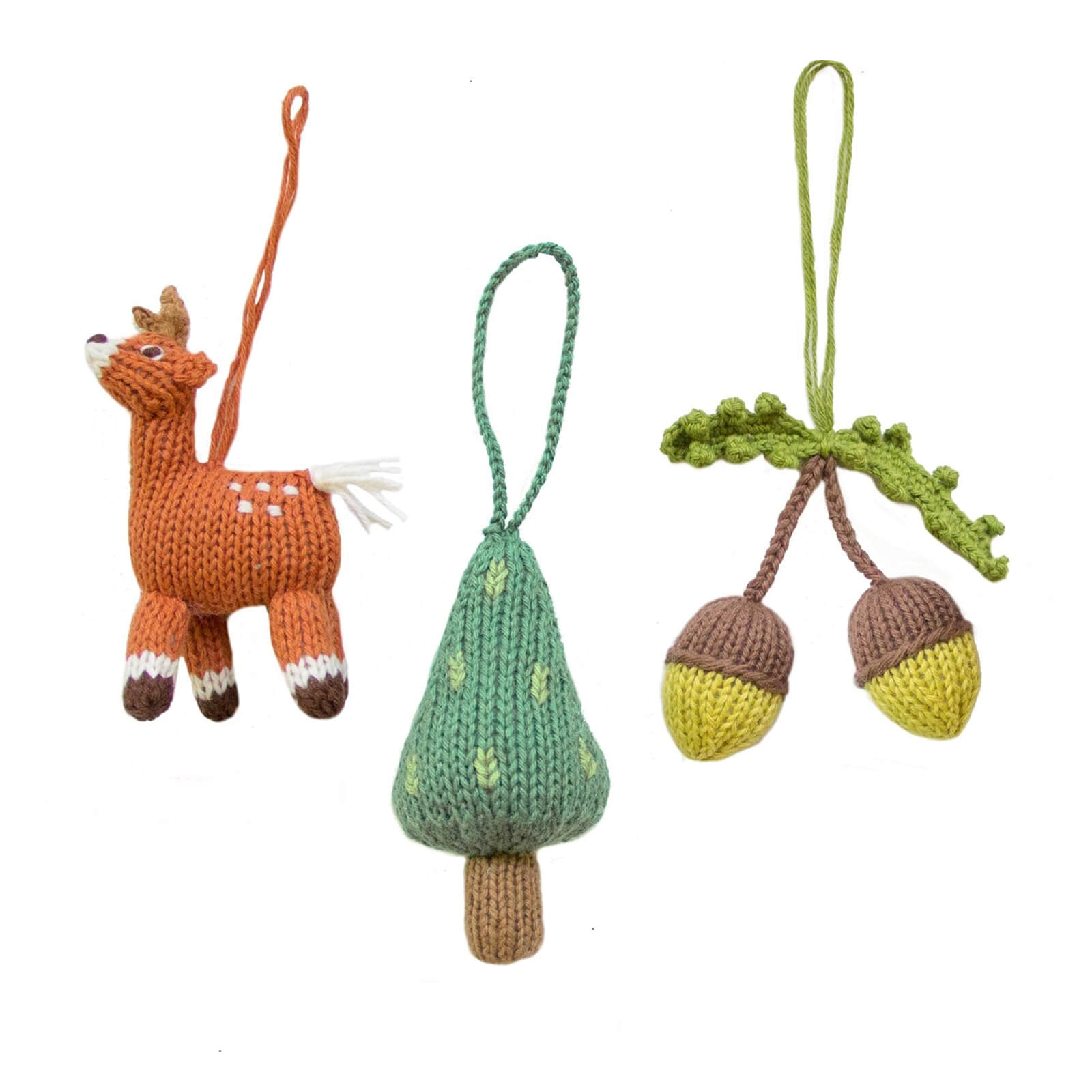 Knitted deer, acorn, and leaf ornament set on a white background