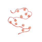 Decorative red floral pattern on a white background