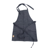 Gray apron with a strap on a white background