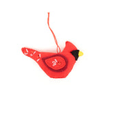 Red cardinal bird ornament on a white background