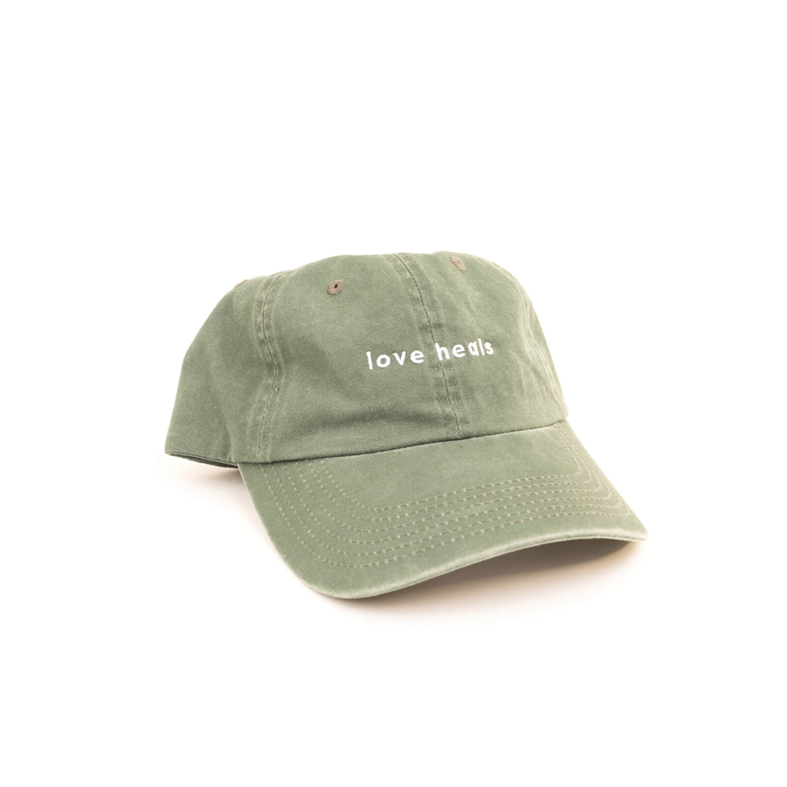 Green cap with 'love heels' text on a white background