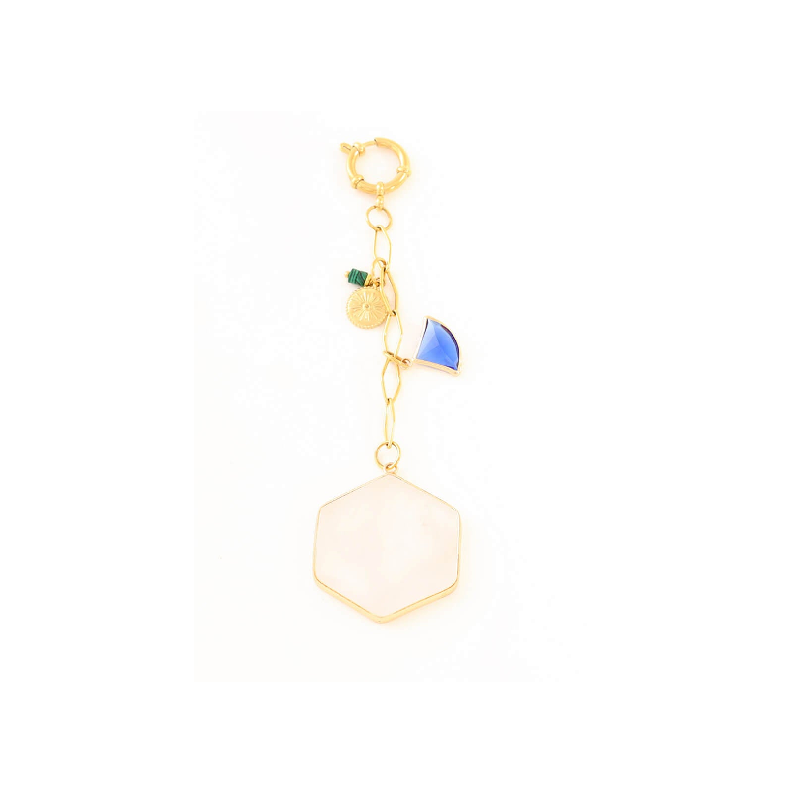 Gold charm with a white hexagonal pendant and blue and green accents on a white background