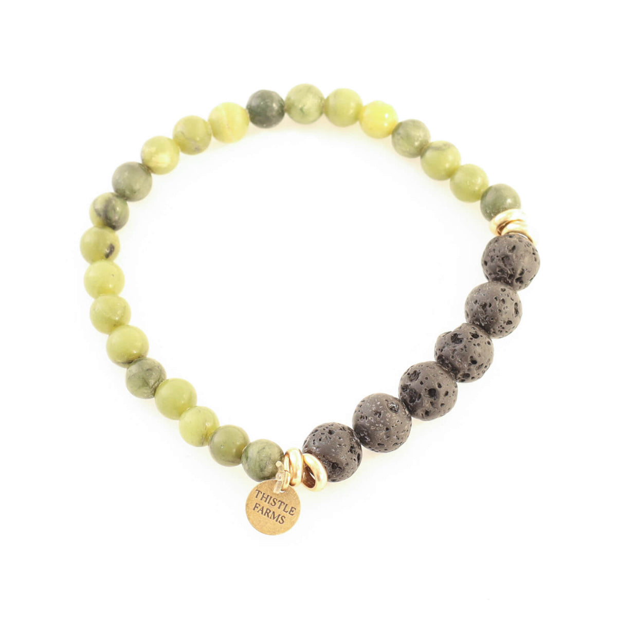 Beaded bracelet with green and gray stones and a gold tag on a white background