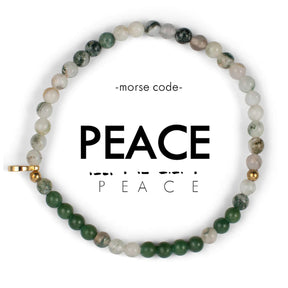 Beaded bracelet with 'PEACE' text on a white background