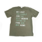 Green t-shirt with motivational quote on a white background