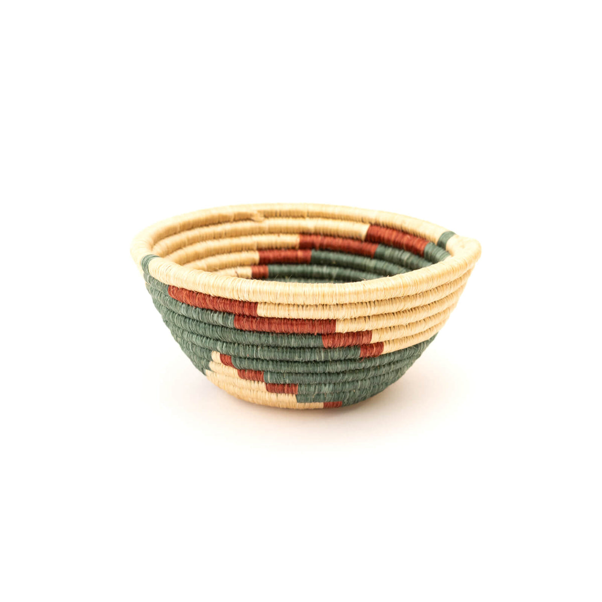 Woven basket with earthy tones on a white background