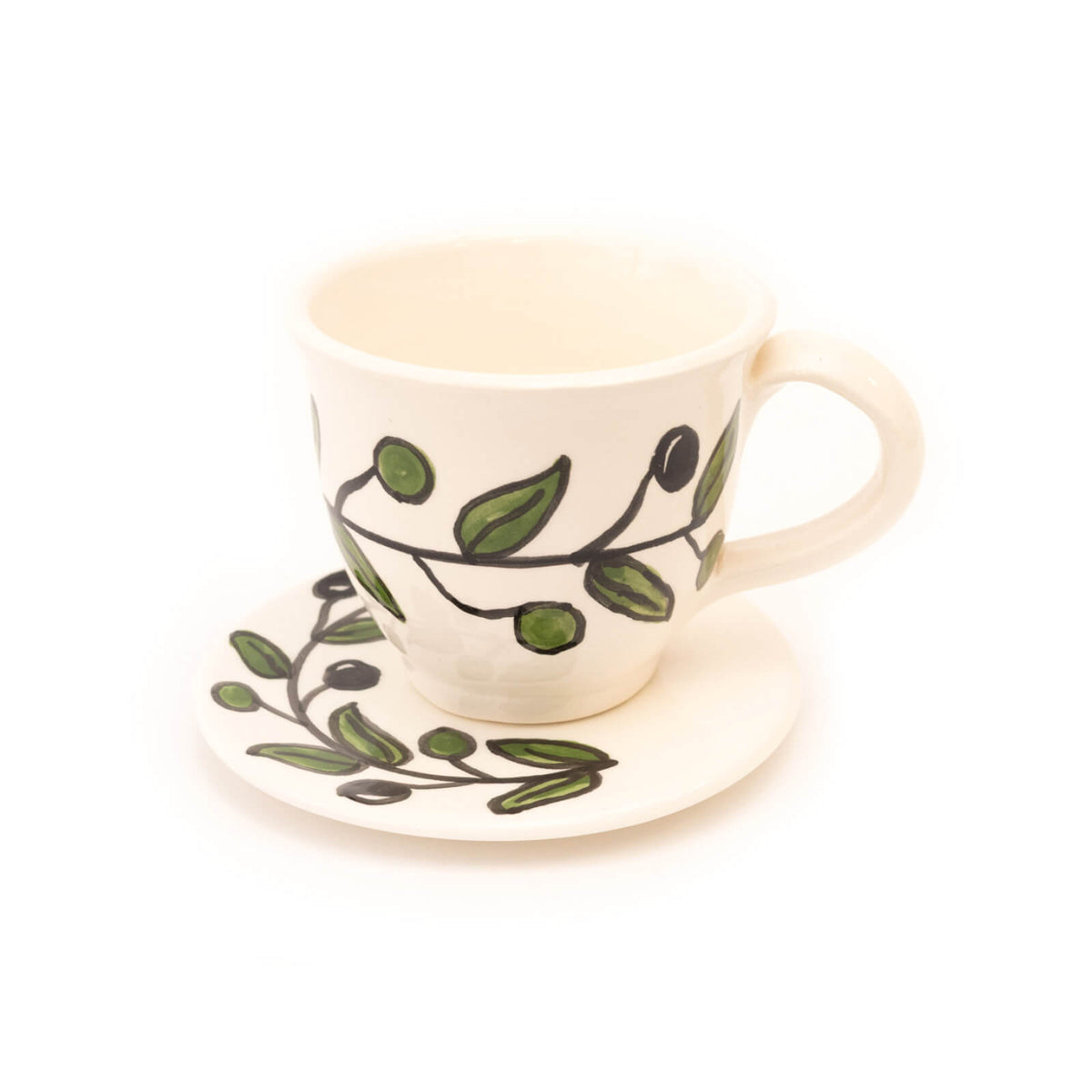 Ceramic cup and saucer with an olive branch design on a white background
