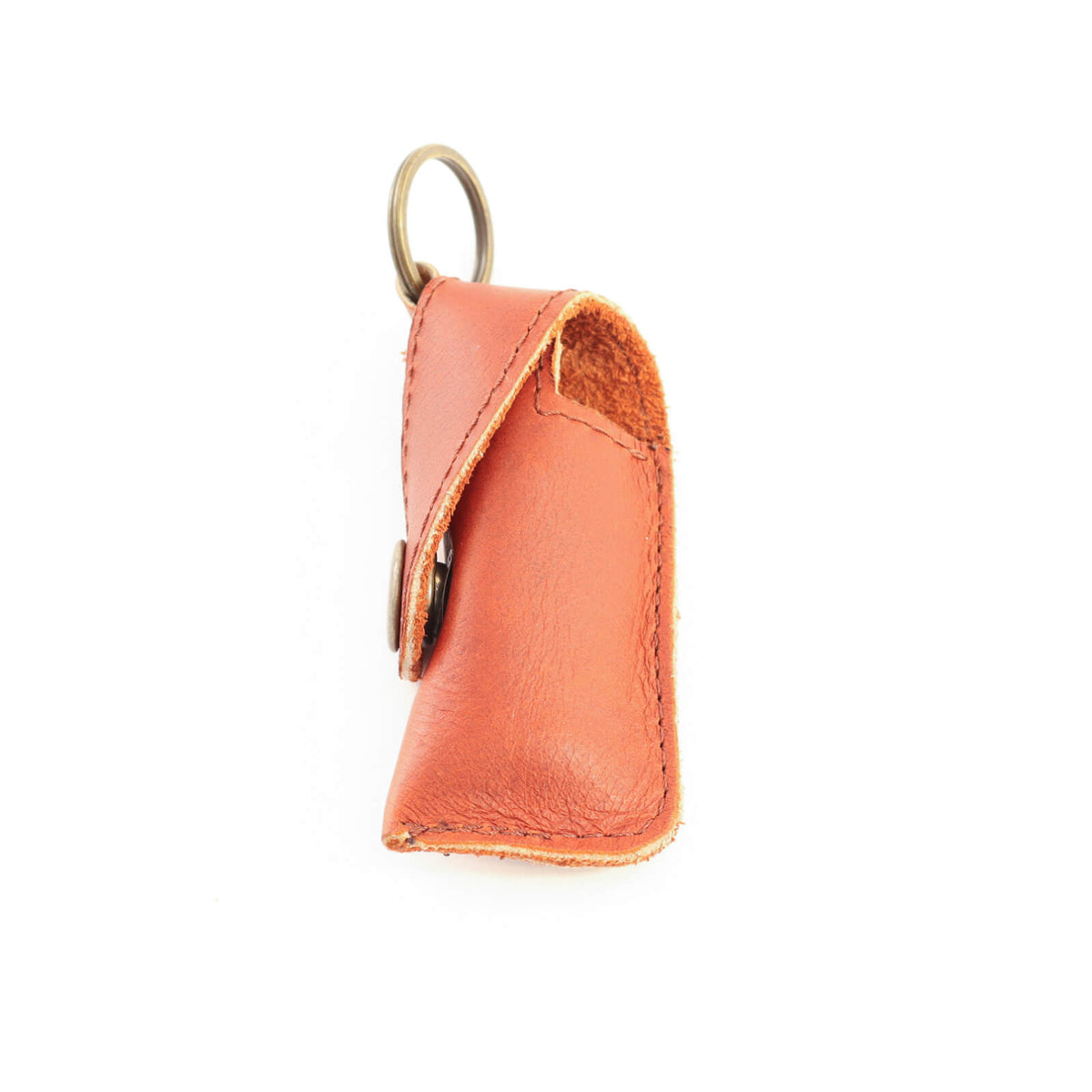Orange leather keychain case on a white background