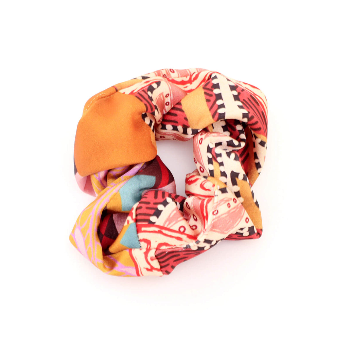 Colorful patterned scrunchie on a white background