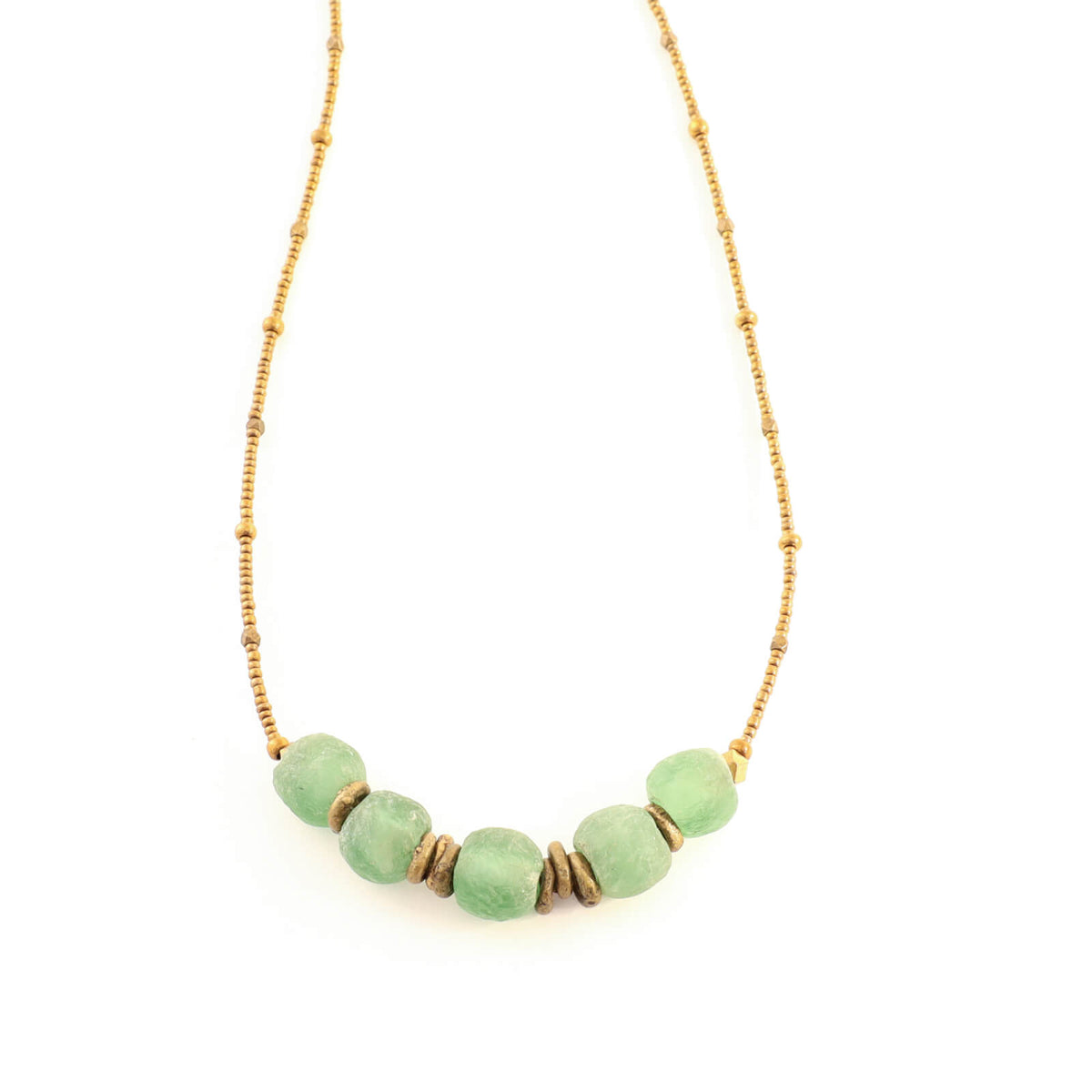 Necklace with green beads and gold accents on a white background