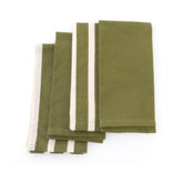 Set of green napkins with white stripes on a white background