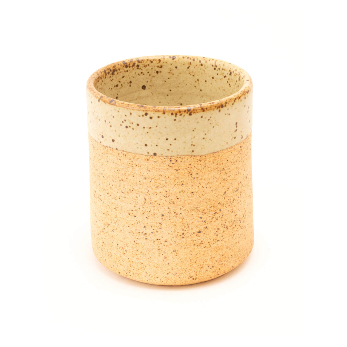 Tan color rustic ceramic mug with lighter cream banded rim.