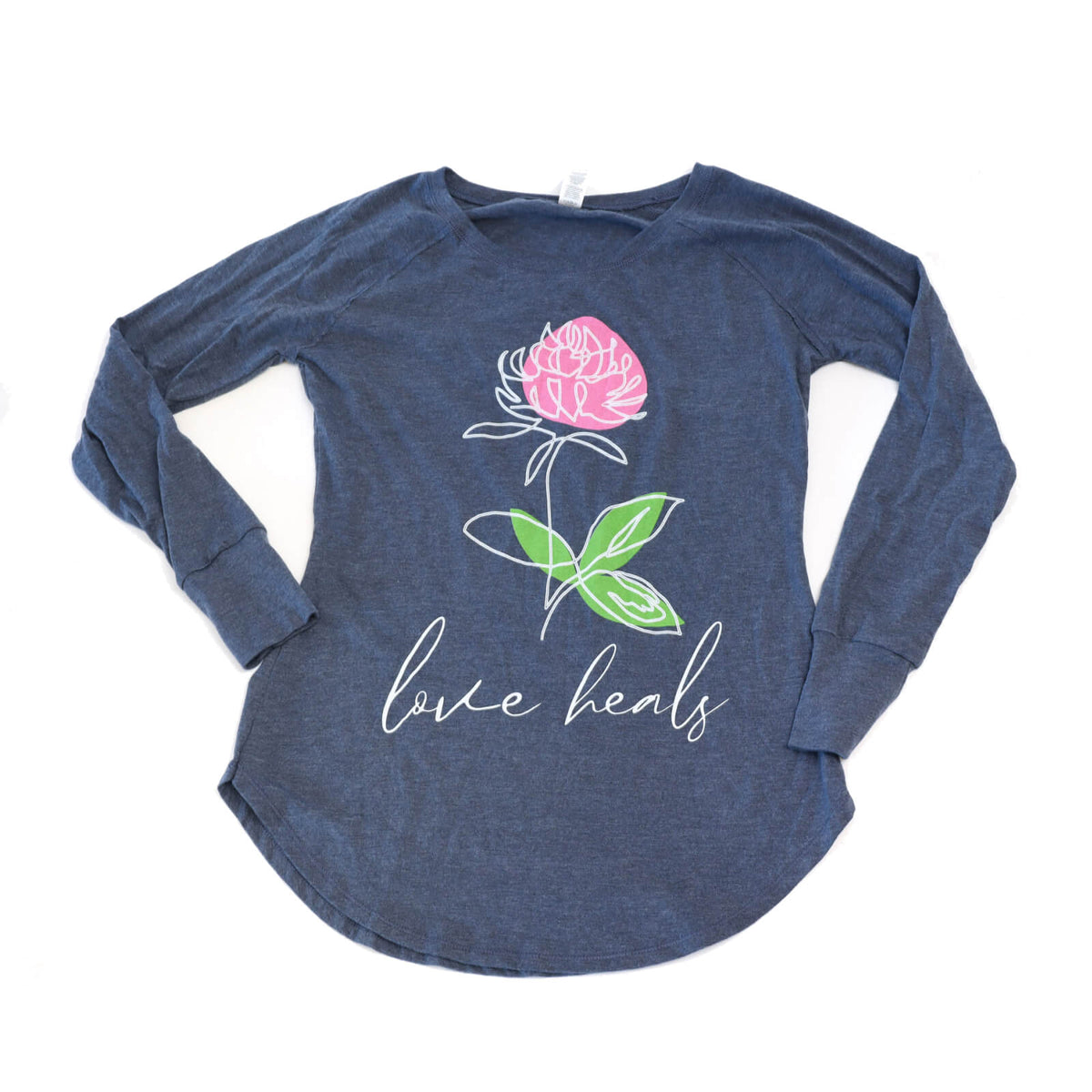 Blue long-sleeve shirt with a pink flower and 'love heals' text on a white background