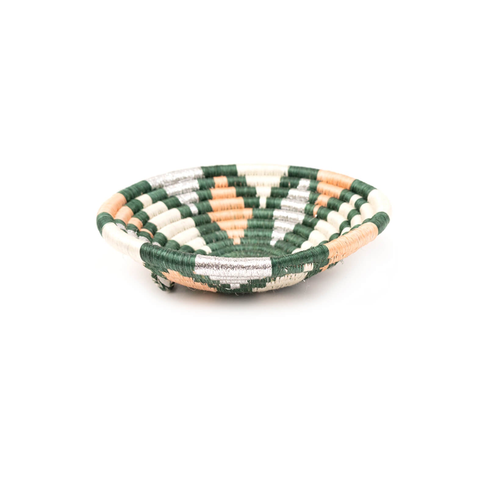 Woven bowl with green, beige, and white pattern on a white background