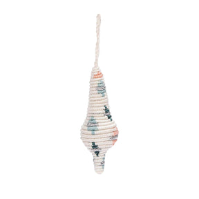 Decorative shell-shaped ornament with a rope on a white background