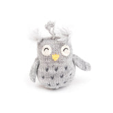 Gray knitted owl toy with white accents on a white background