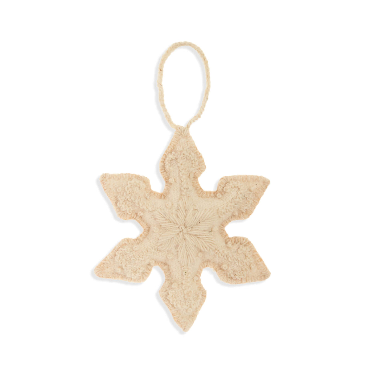 Beige star-shaped ornament with a string on a white background