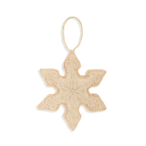 Beige star-shaped ornament with a string on a white background