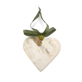 Heart-shaped marble ornament with a green ribbon on a white background