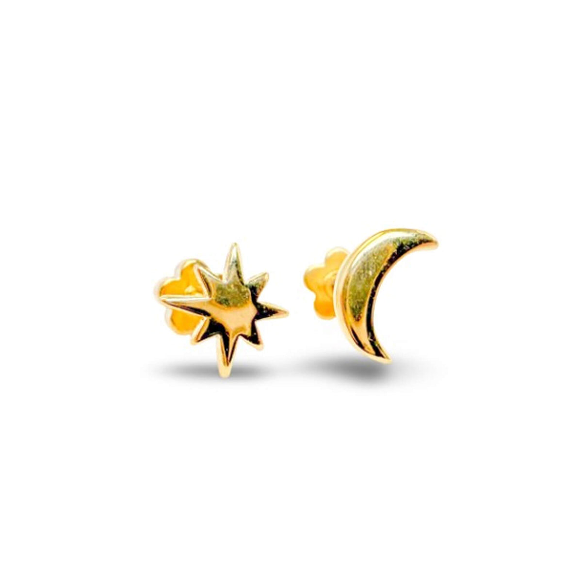 Gold star and moon earrings on a white background