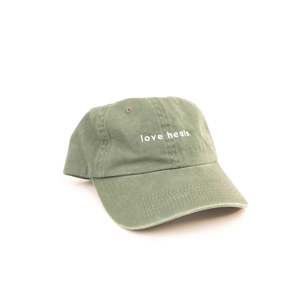 Green cap with 'love heels' text on a white background