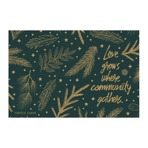 Decorative card with gold foliage and inspirational quote on a dark green background